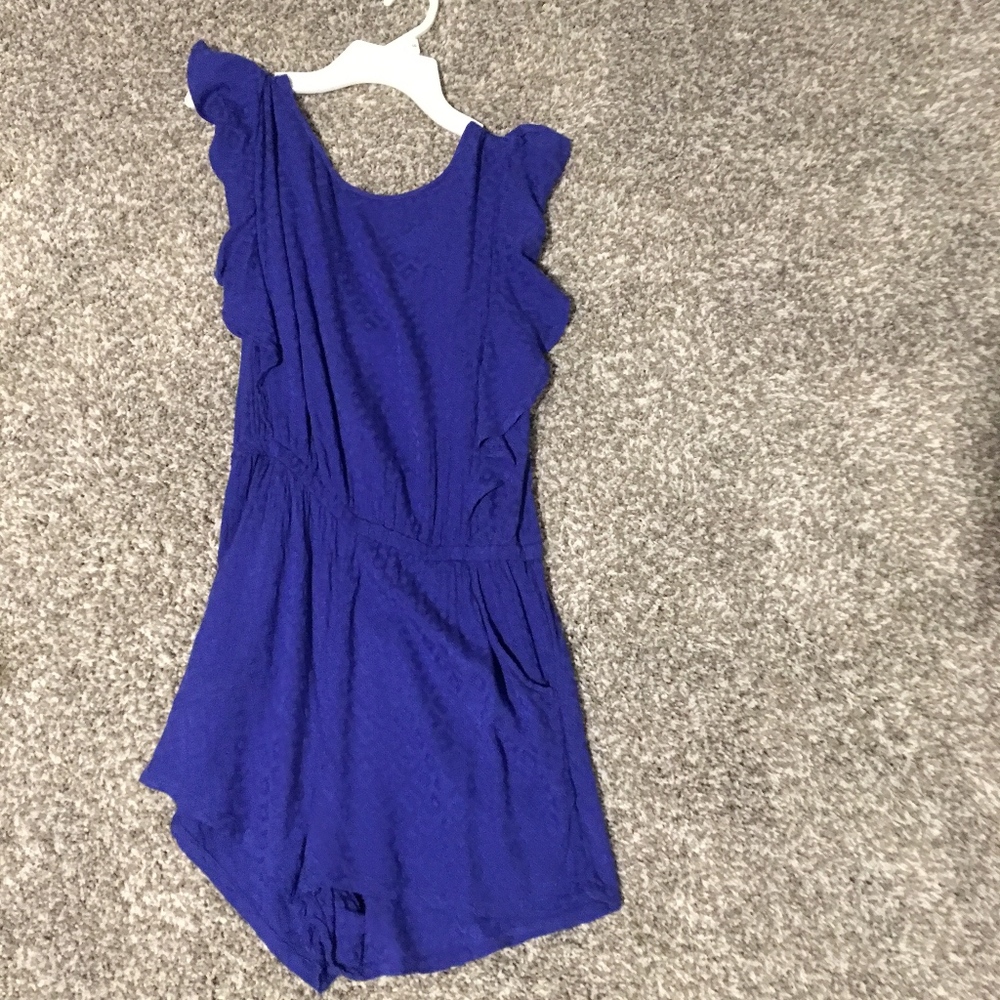 purple ruffled romper